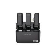A wireless microphone set in black color, with the Green Lion brand visible on the charging case.