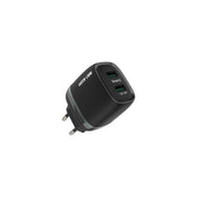 A black Green Lion Dual USB wall charger with a label showing the brand and the inclusion of a USB-A to Lightning cable.