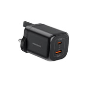 Black charging adapter with two USB ports on a white background