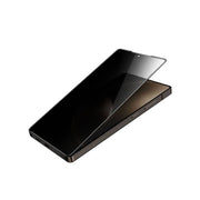 A black privacy shield glass for Samsung Galaxy S25 Ultra with a visible fingerprint unlock feature, showcasing its placement on the phone.