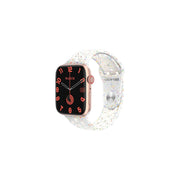 A Green Lion Ultimate Smart Watch with a rose gold case and a silicone strap featuring a digital display with red hands and markings.